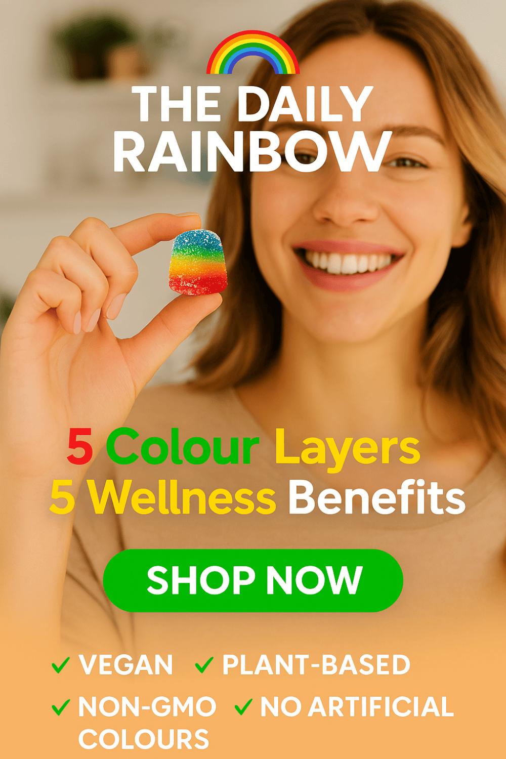 A happy woman holding up a single The Daily Rainbow gummy. The image has text overlays that read '5 Colour Layers 5 Wellness Benefits,' 'Vegan,' 'Plant-Based,' 'Non-GMO,' and 'No Artificial Colours.'